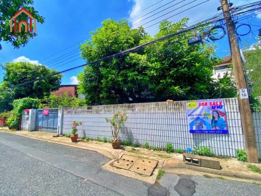 Exterior view of property with a for-sale sign