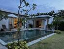 Modern backyard with pool at dusk