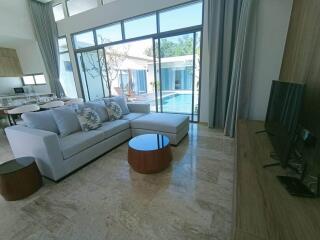 Modern living room with a view of the pool