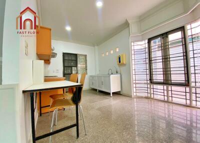 Bright kitchen with dining area