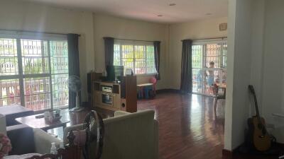 Spacious living room with large windows