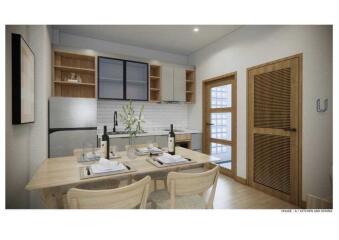 Modern kitchen and dining area with wooden table and chairs