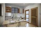 Modern kitchen and dining area with wooden table and chairs