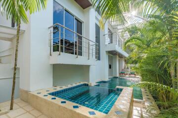 Pool area with modern building