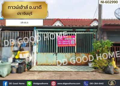 Front view of a property with a closed gate