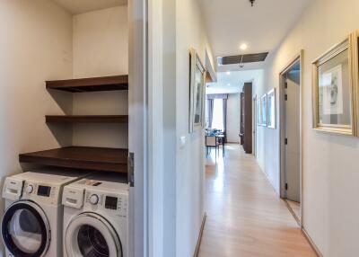 Hallway view with laundry area