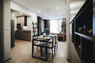 Modern open-plan living and dining area with kitchen