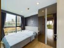 modern bedroom with large windows and city view