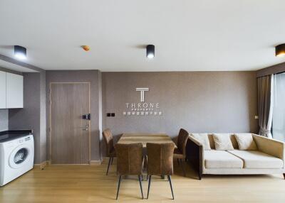 Modern living and dining area with natural light