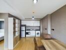 Modern kitchen with appliances and dining area