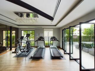 Modern gym with treadmills and exercise equipment