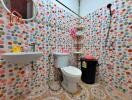 Colorful bathroom with polka dot tiles