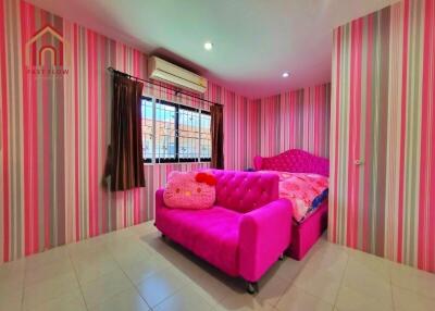 Bedroom with colorful pink themed decor