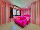 Bedroom with colorful pink themed decor