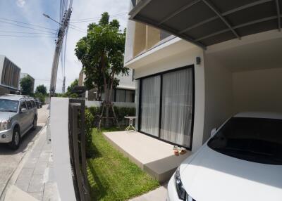 House exterior with carport