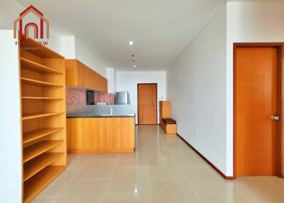 Modern kitchen with wooden cabinets and open shelving