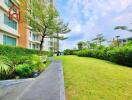 Apartment building exterior with garden