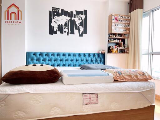 Modern Bedroom with Decorative Headboard and Large Window