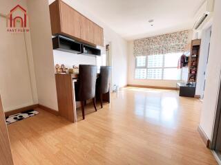 Modern living room with wooden flooring and dining area