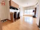 Modern living room with wooden flooring and dining area