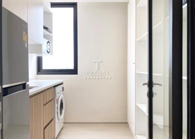 Modern kitchen with laundry area