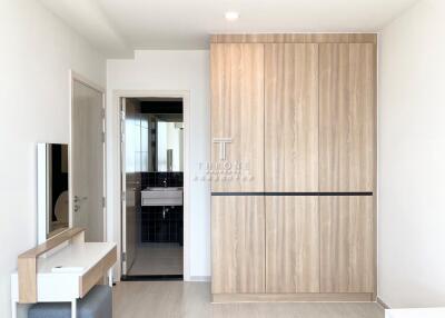 Modern bedroom with wardrobe and vanity desk