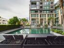 Apartment complex with outdoor swimming pool