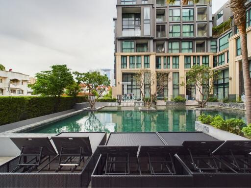 Apartment complex with outdoor swimming pool