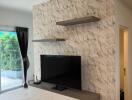 Modern living room with TV and marble accent wall