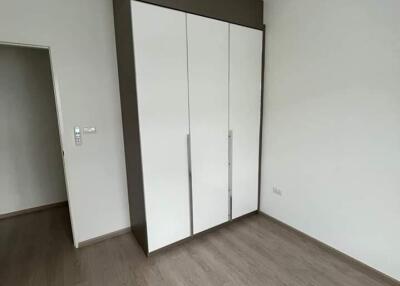 Empty bedroom with a large wardrobe