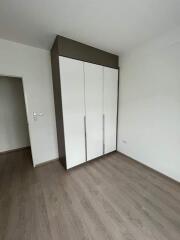 Empty bedroom with a large wardrobe