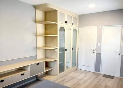 Bedroom with built-in wardrobe and shelves