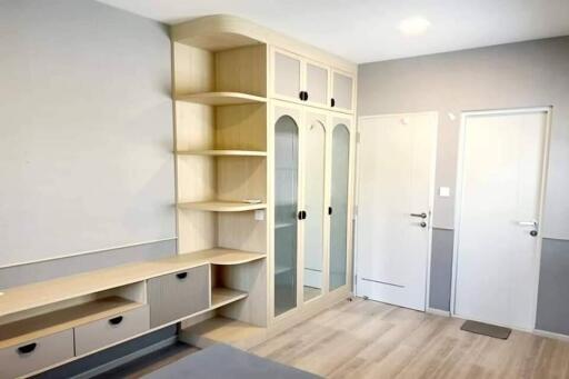 Bedroom with built-in wardrobe and shelves