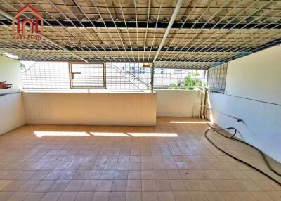 Spacious balcony with tiled flooring