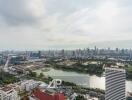 Panoramic view of city skyline and lake from a high vantage point