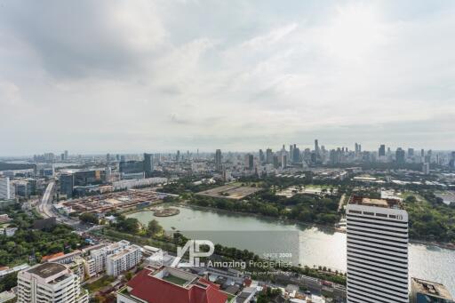 Panoramic view of city skyline and lake from a high vantage point