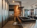 Modern kitchen with stainless steel appliances and wooden accents