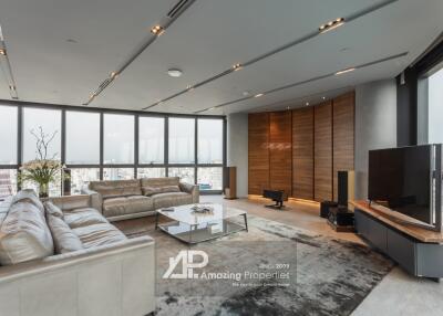 Modern living room with large windows and city view