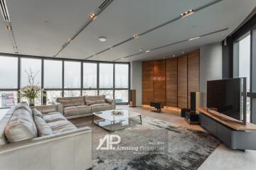 Modern living room with large windows and city view