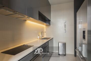 Modern kitchen with sleek cabinetry and appliances