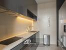 Modern kitchen with sleek cabinetry and appliances