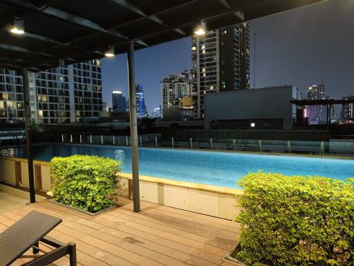 Rooftop pool with city skyline view