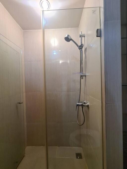 Shower area with glass enclosure