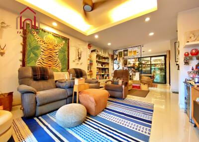 Cozy living room with vibrant decor and ample seating