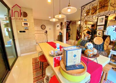 Cozy dining area with modern decor and wooden table