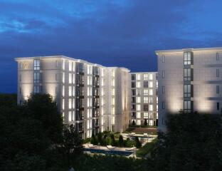 Modern apartment building illuminated at night