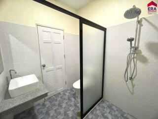 Modern bathroom with frosted glass shower partition