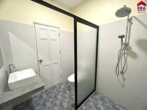 Modern bathroom with frosted glass shower partition