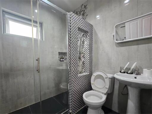 Modern bathroom with large shower area and contemporary fixtures