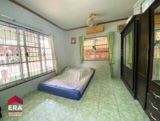 Bedroom with air conditioning and floor mattress